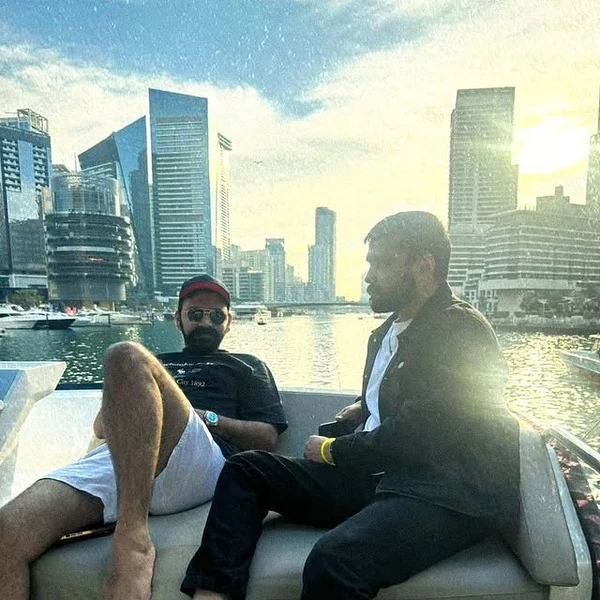 Viraj on a boat in Dubai Marina at sunset